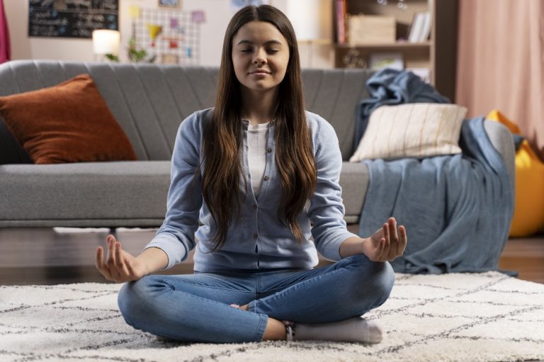 teenage-girl-doing-yoga-home
